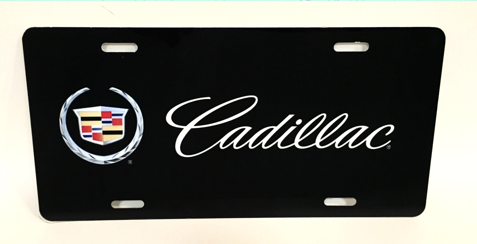 thumbnail image 2 of Cadillac Dual Logo Chrome License Plate - Front Or Rear - New 2 of 4